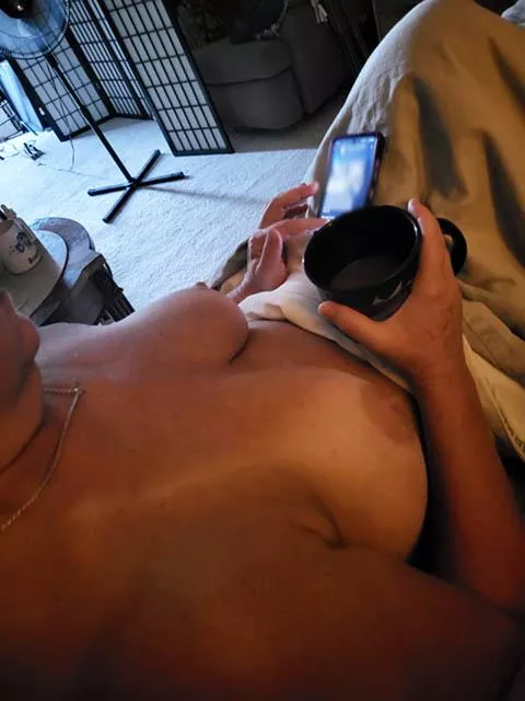 My coffee slowly waking me for work, only thing better is adding a cute young mouth between my MILF legs!