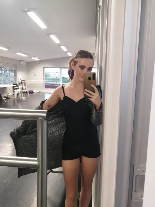 Capturing allure in a mirror, winks and smiles! F18