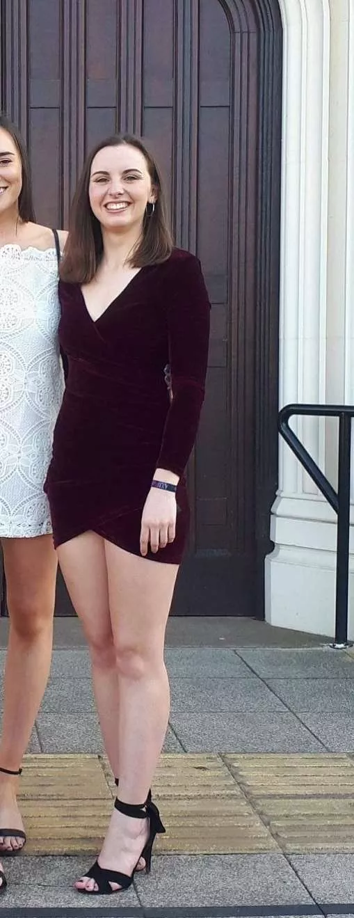 Amazing legs in short dress and black heels