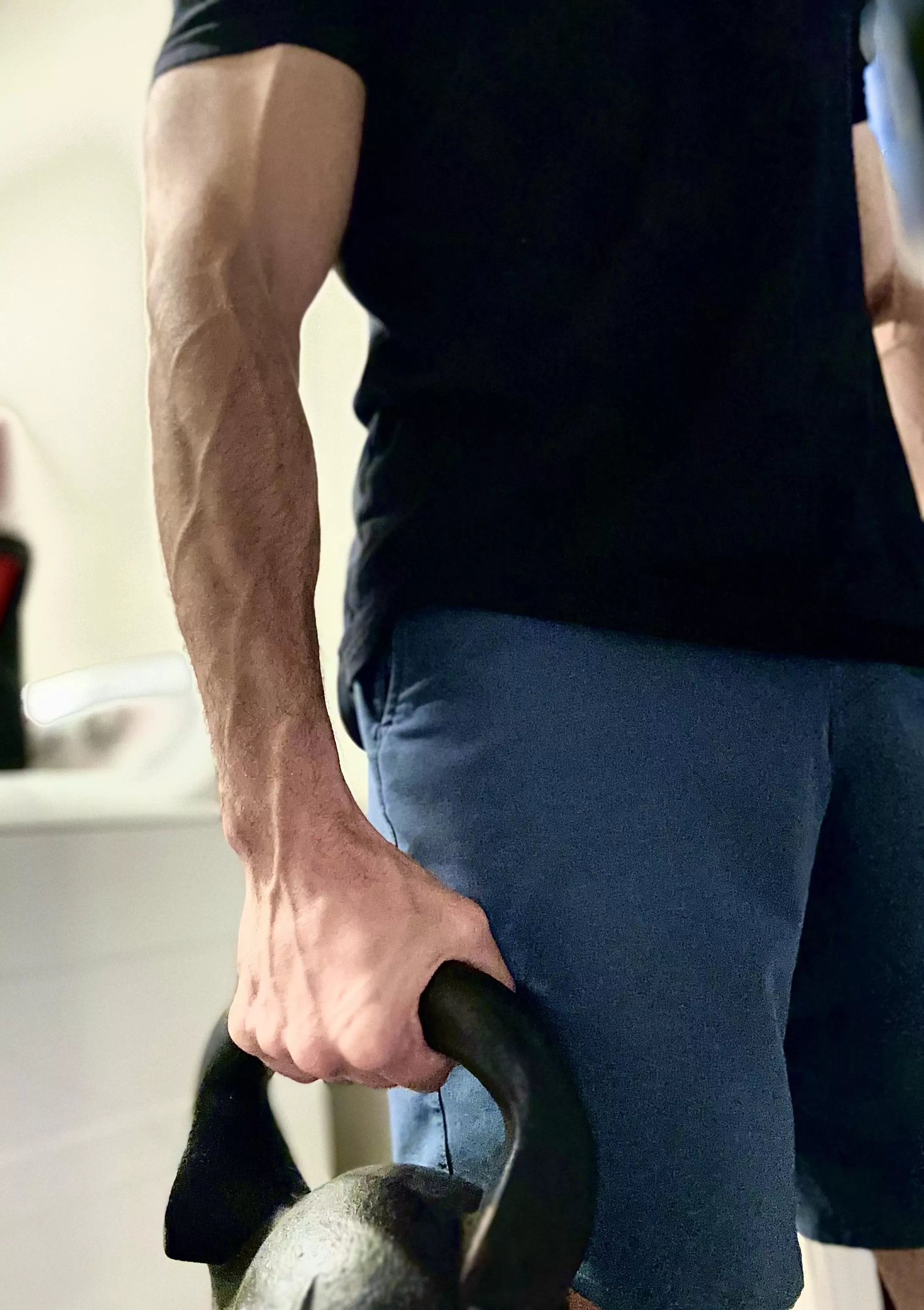 Kettlebells always help showcase the vascularity