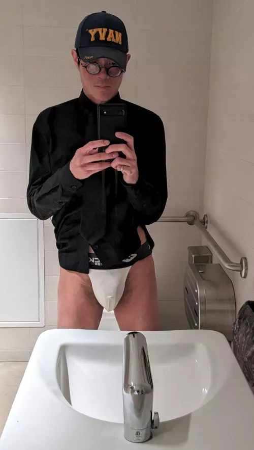 Black shirt and tie.