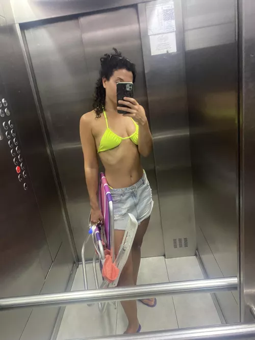 In the elevator Going to the terrace in my bikini