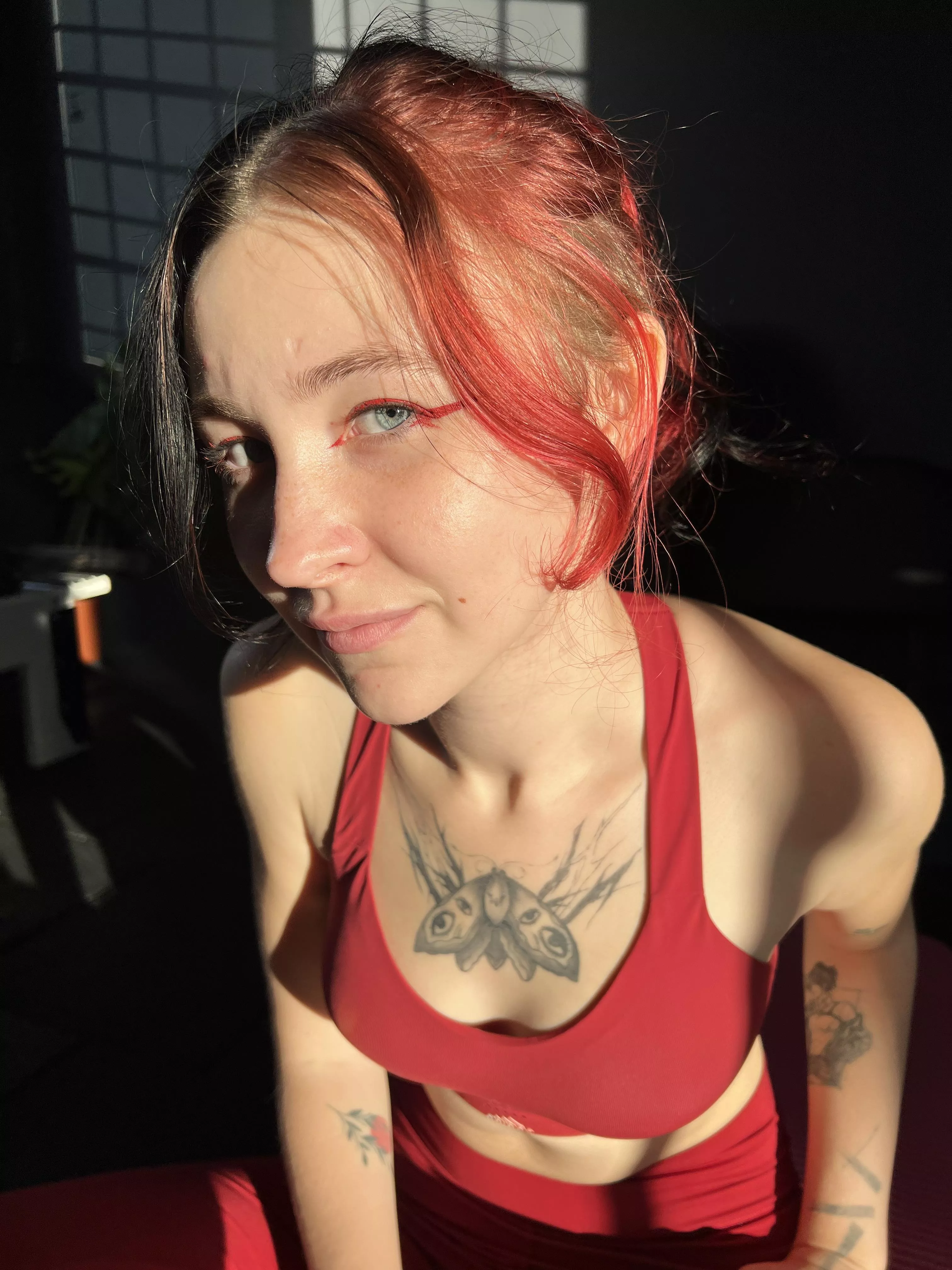 That red top goes so well with my hair