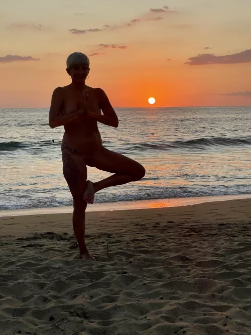 Beach, sunset, naked yoga…perfect