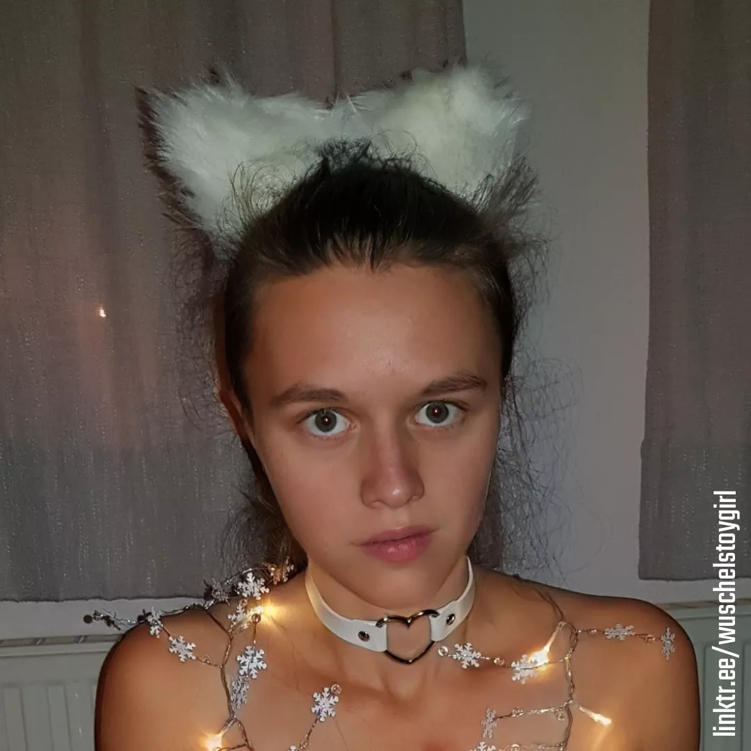 toyGirl Ana Lena as a snow angel with fluffy ears and a collar