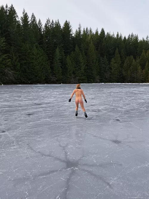 Ice skating on a frozen lake