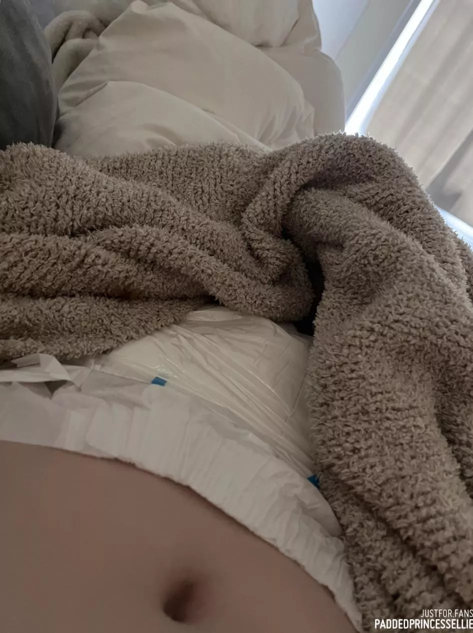 hiding my very full diaper under the blankets 🙈