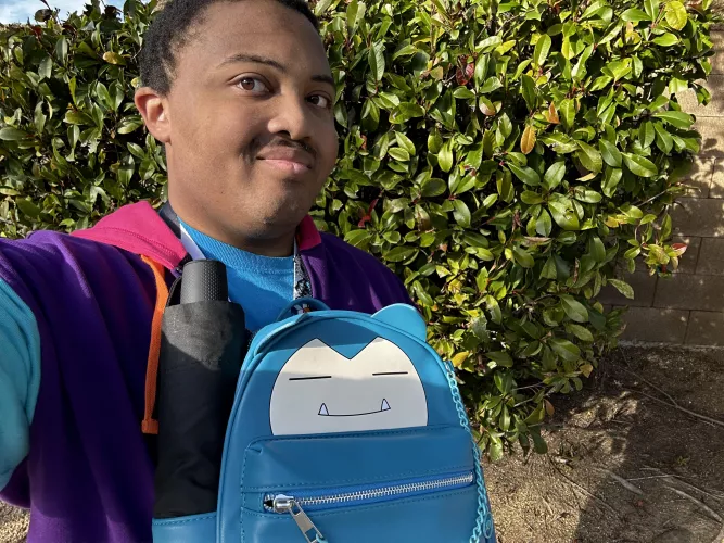 Good afternoon, went on a walk with my Snorlax bag 🥰