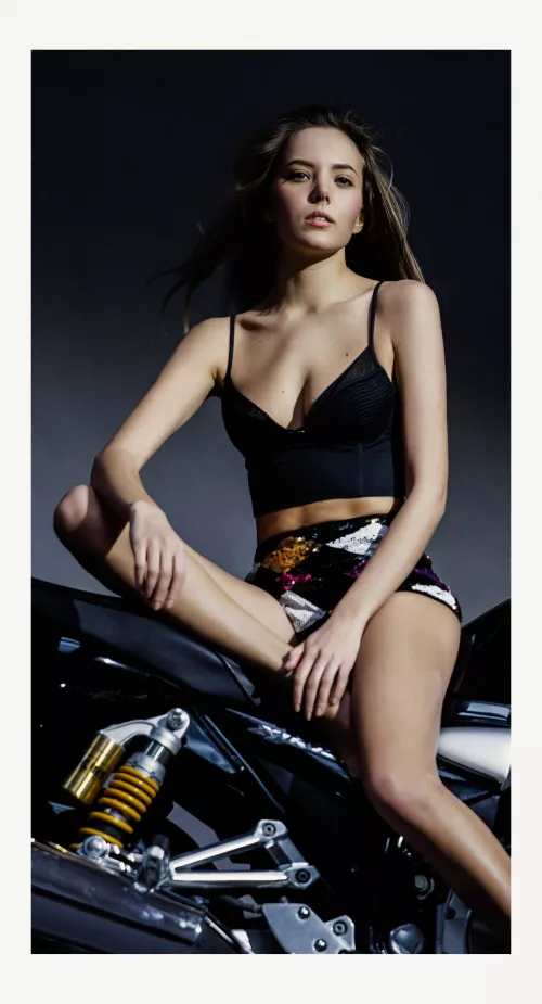 Katya Clover on a motorbike made by Pedro Saudek