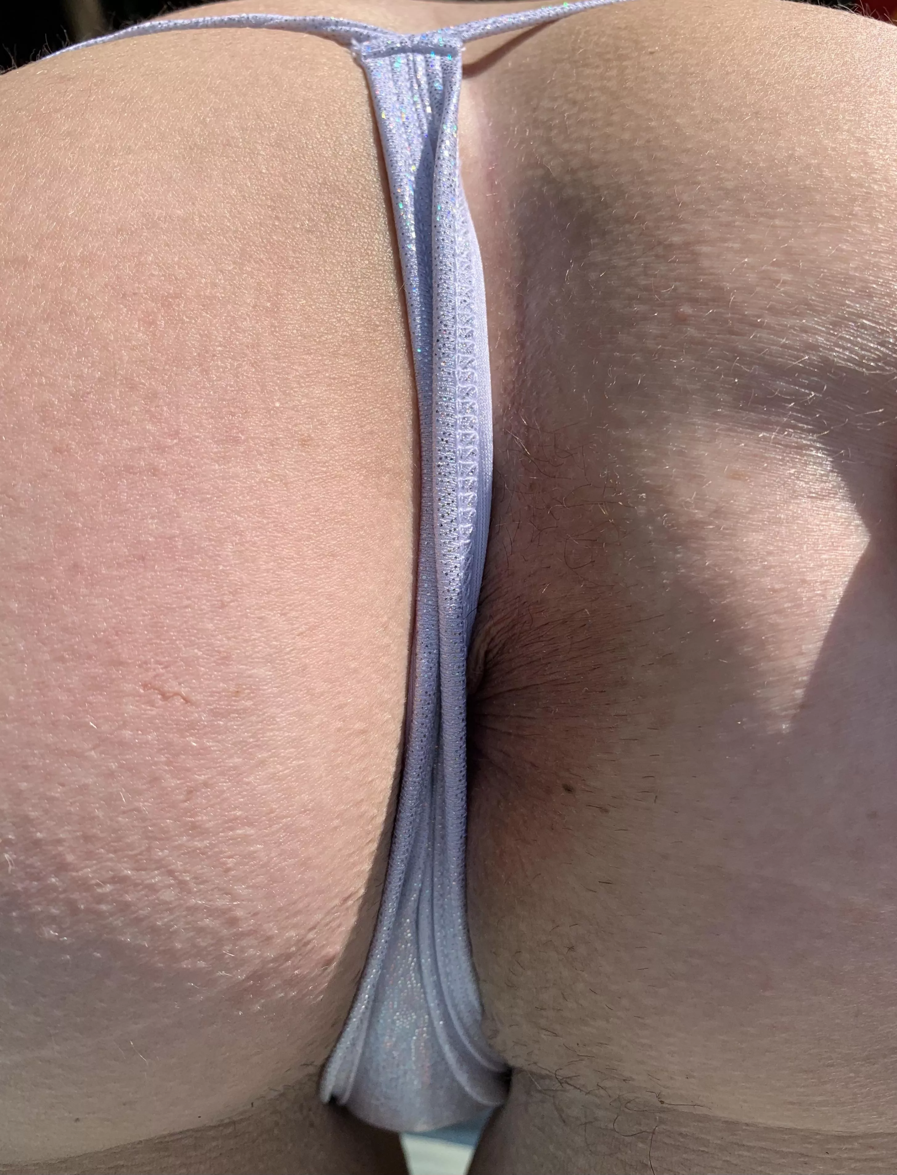 My sneaky starfish slips past silver string in the sun