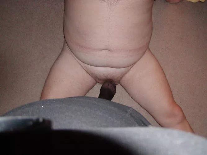 Under her stockinged foot