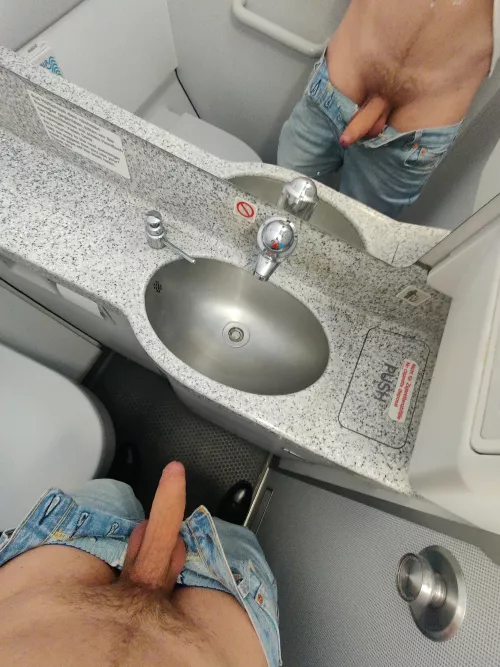 Horny uncut on a plane