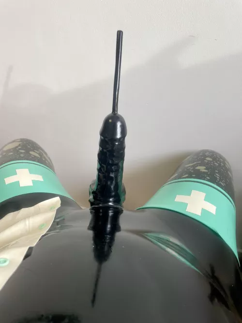 Enjoying to be covered into latex