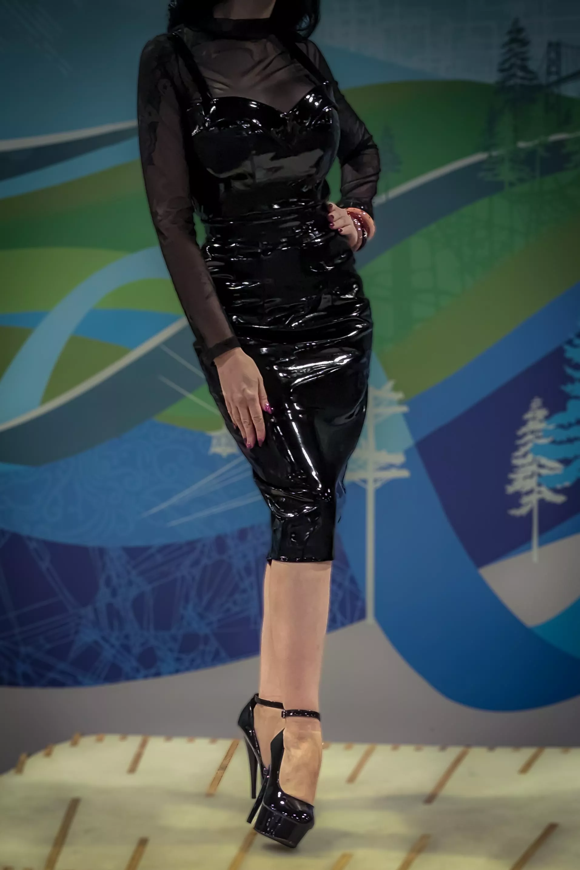 The shine the outfit shows off my curves just right