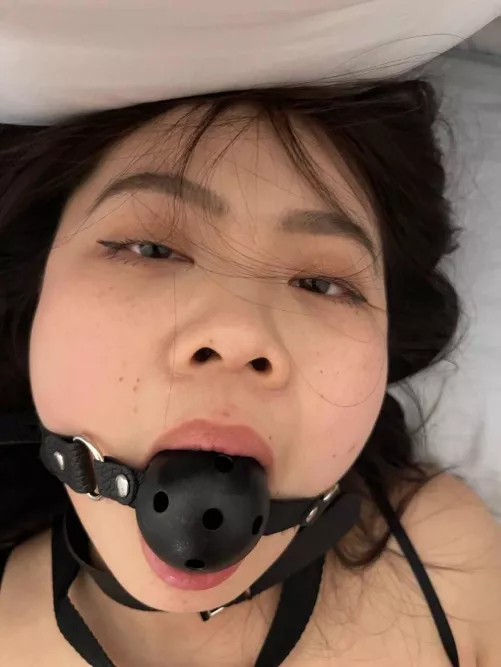 Asian slut got her mouth gagged