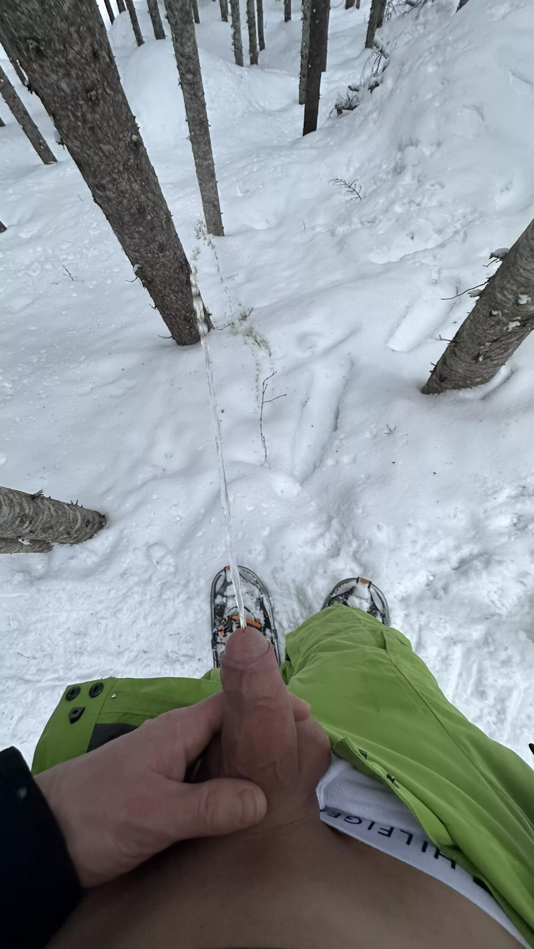 Taking a piss while snow shoeing