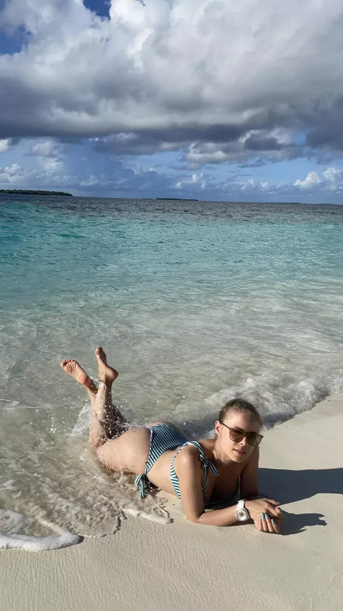 Bathing in the sun on an empty beach