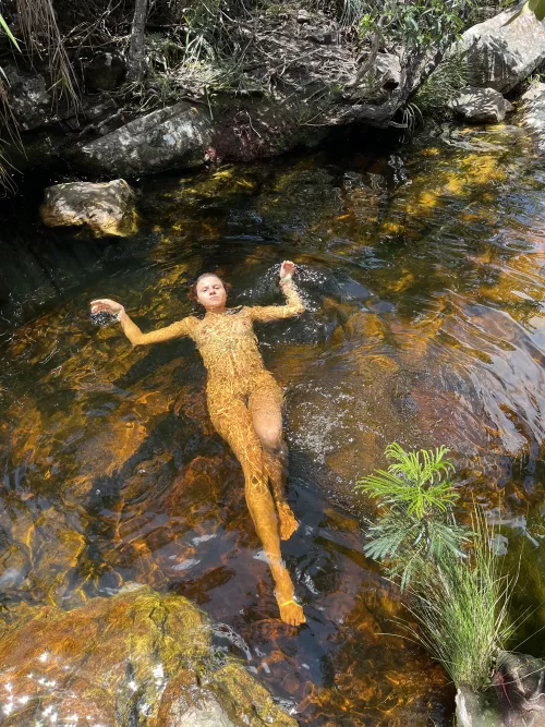 Flowing with the waters of life, where each wave is a dance and every dive is a cosmic connection. 🌊✌️