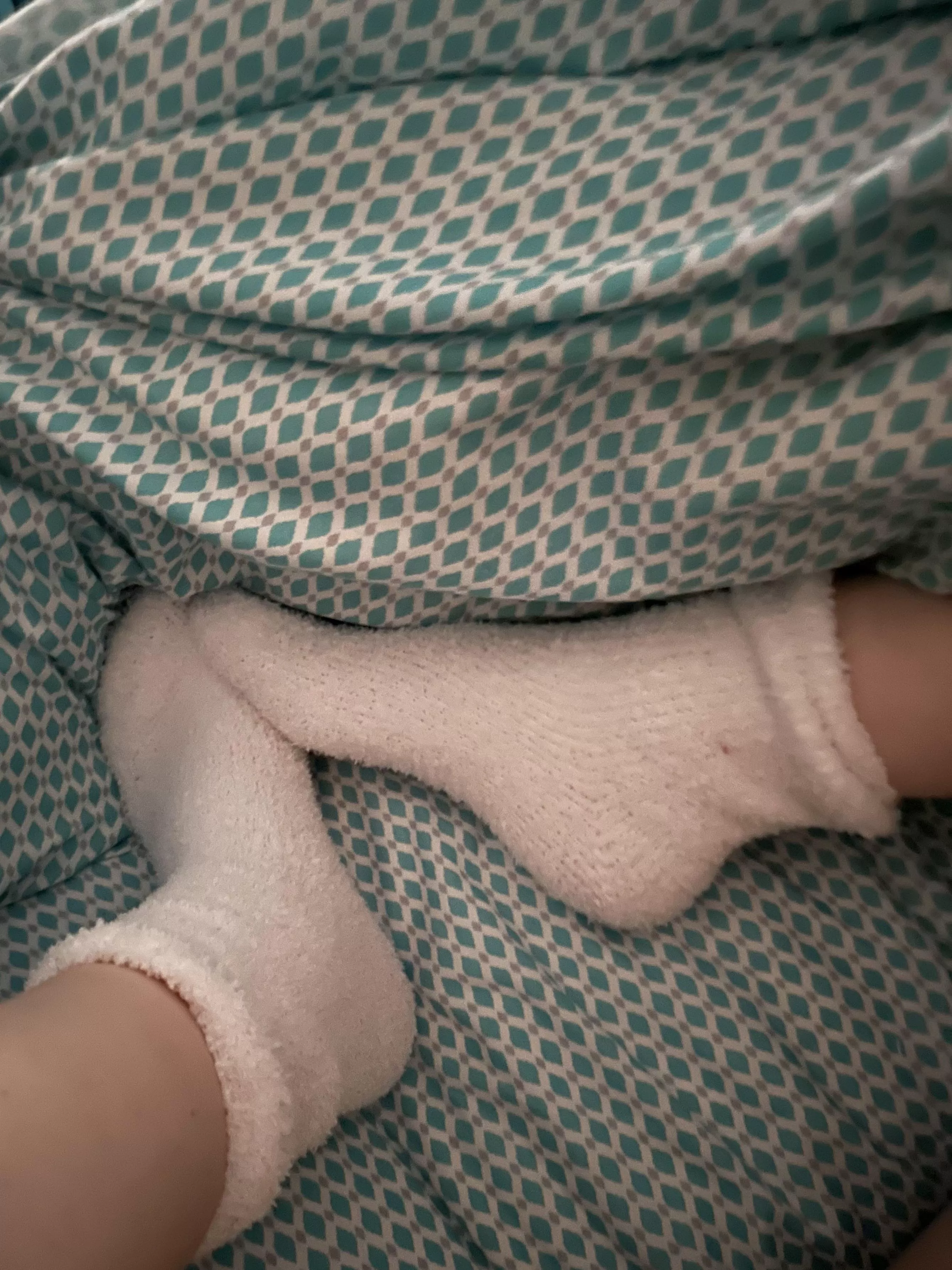 In bed with my fuzzy socks. Keep them on or peek under?