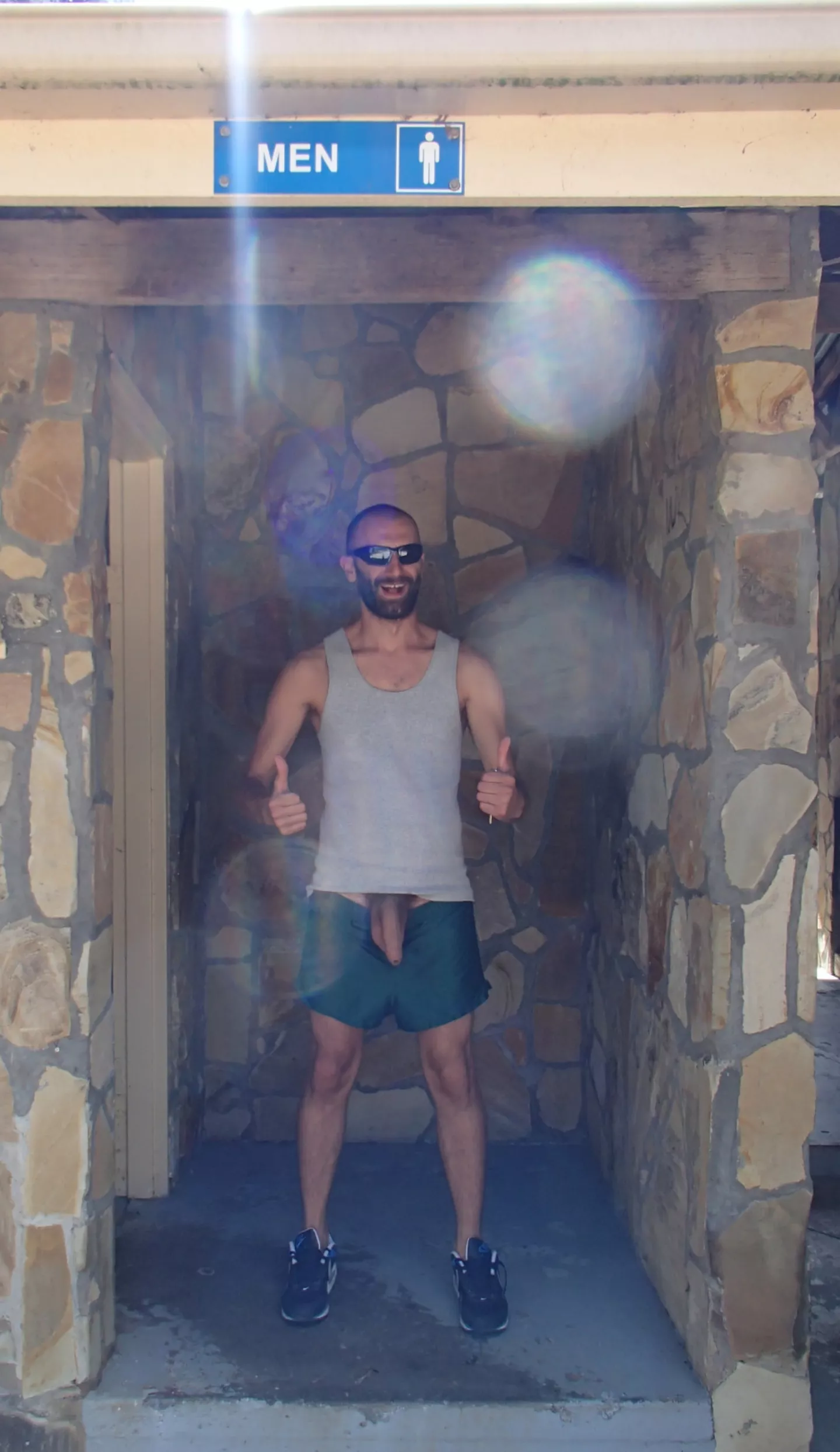 Old photo of me coming out of reststop toilet.