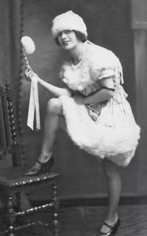 a scandalous floozie with her ankles all bare