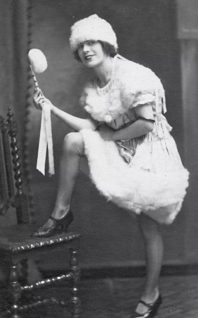 a scandalous floozie with her ankles all bare