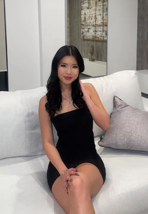 Asian babe in a black dress