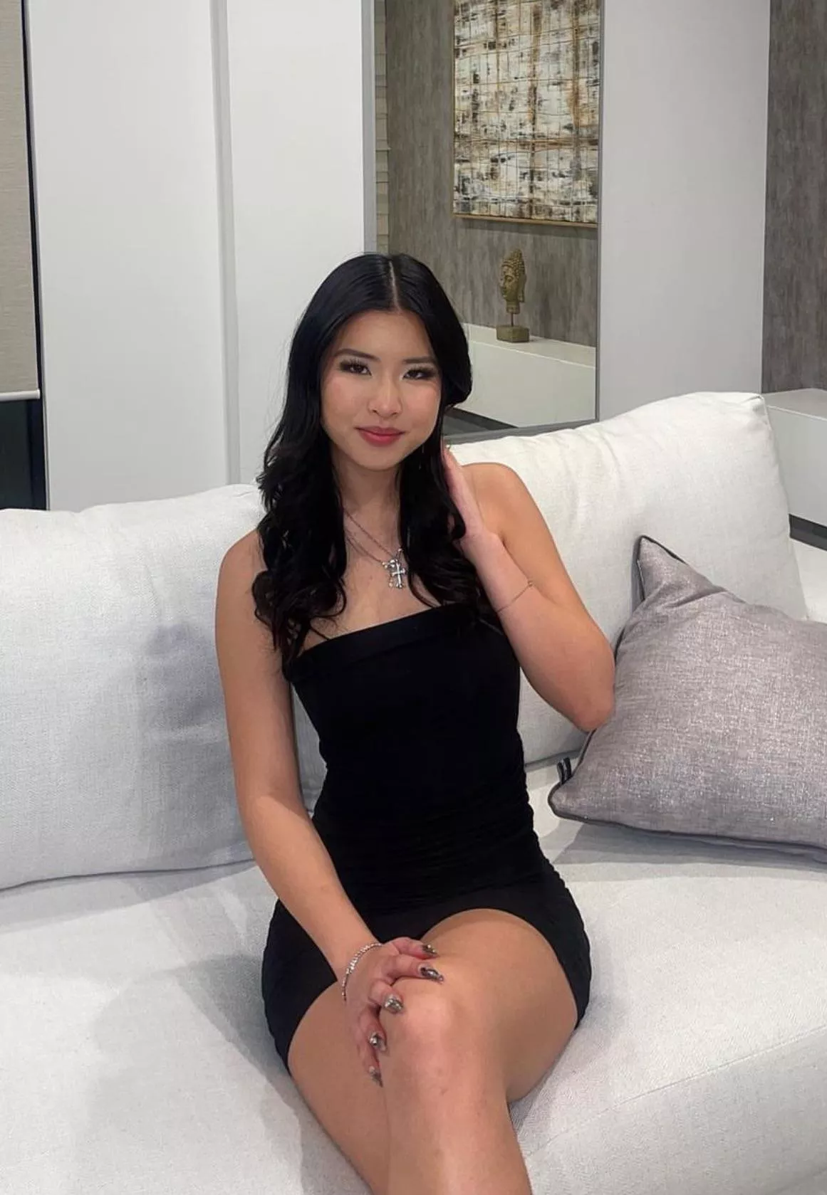Asian babe in a black dress