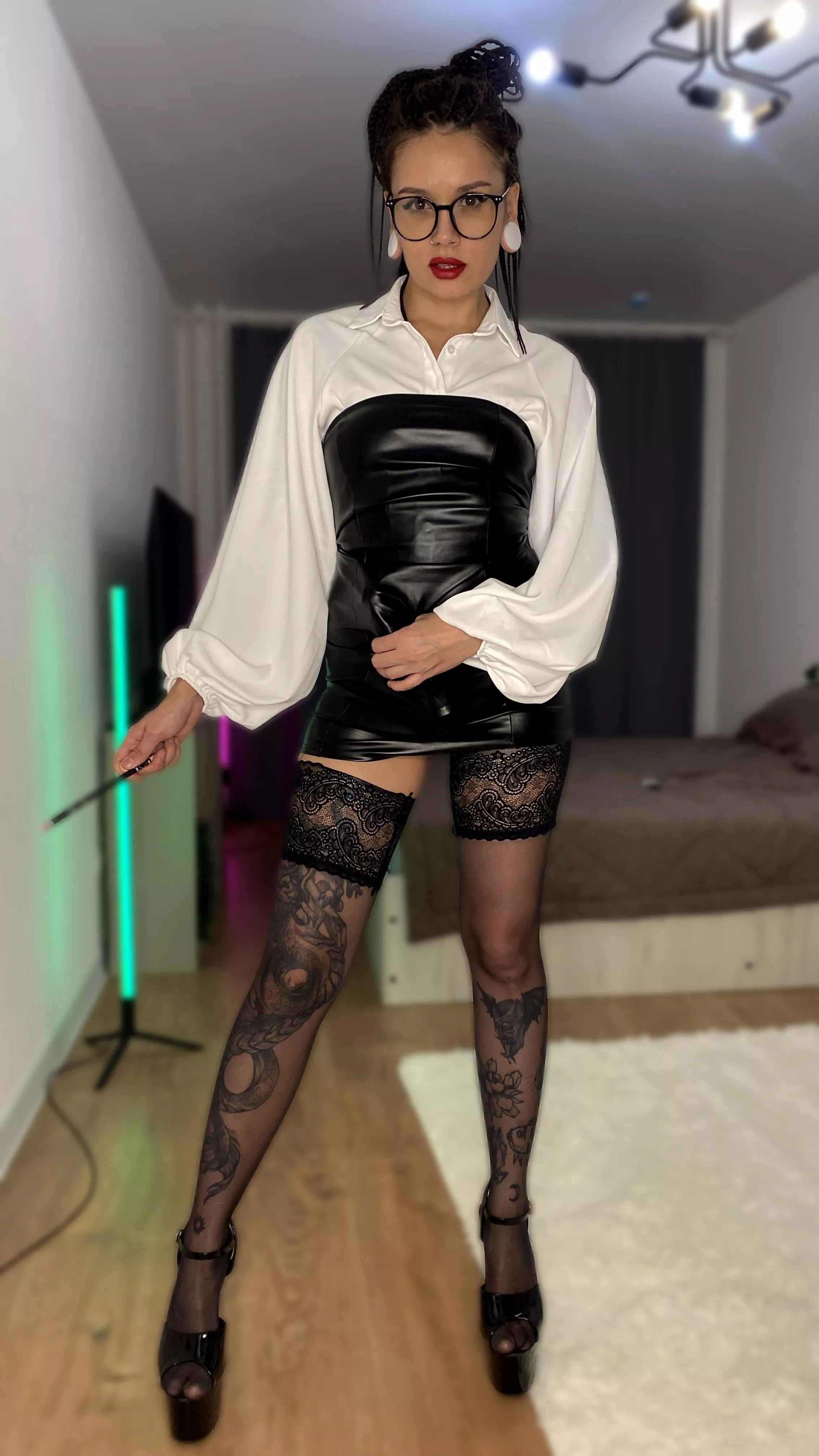 You noticed that the teacher looks a little unusual today and has something sticking out from under his dress. Would you be embarrassed to stay after class and find out?