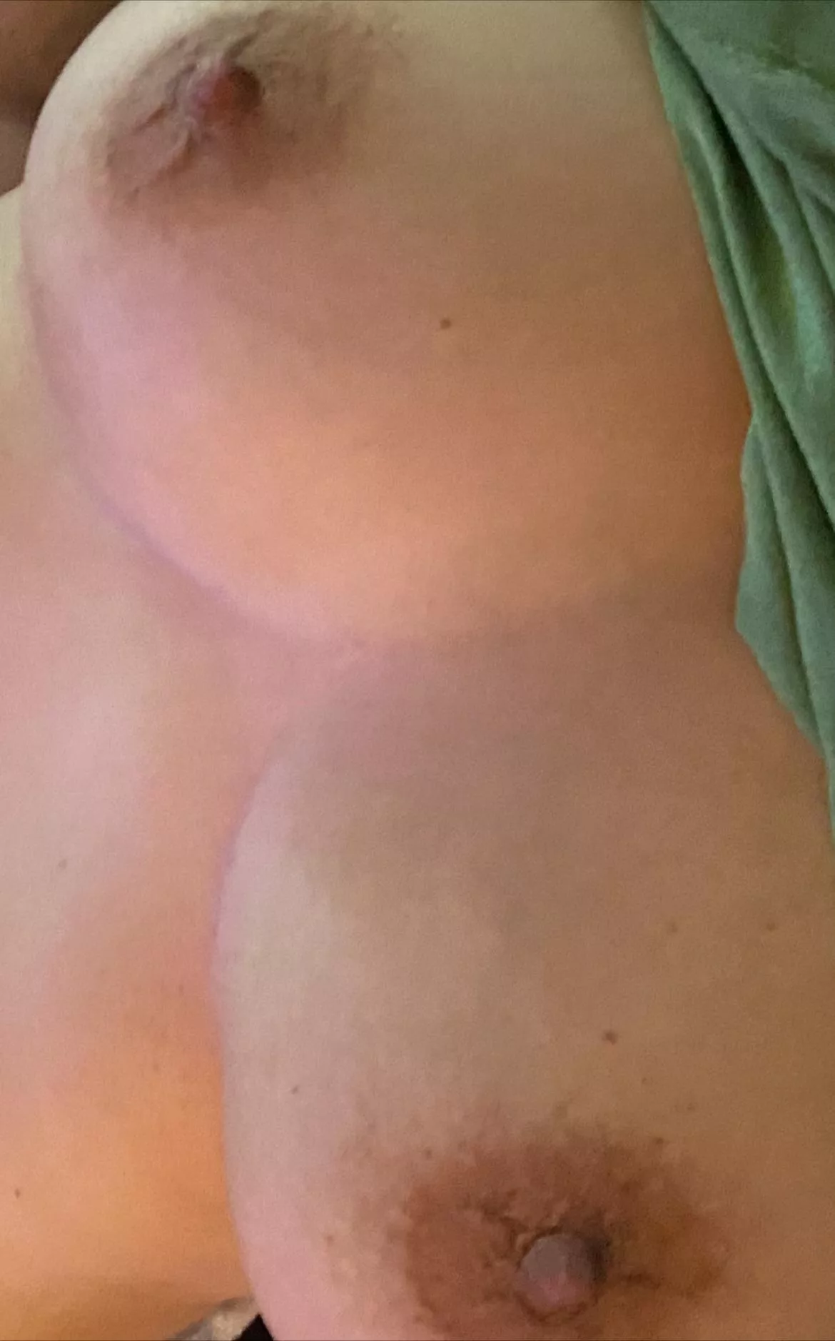 Wifes brown and bumpy tits