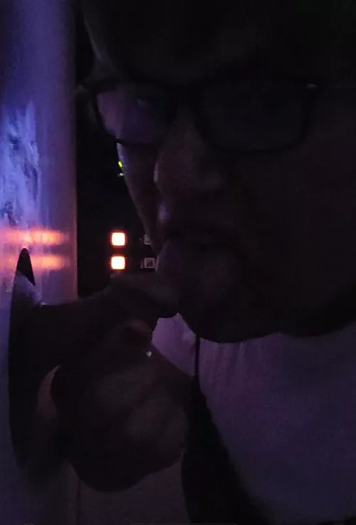Sucking cock at adult arcade.