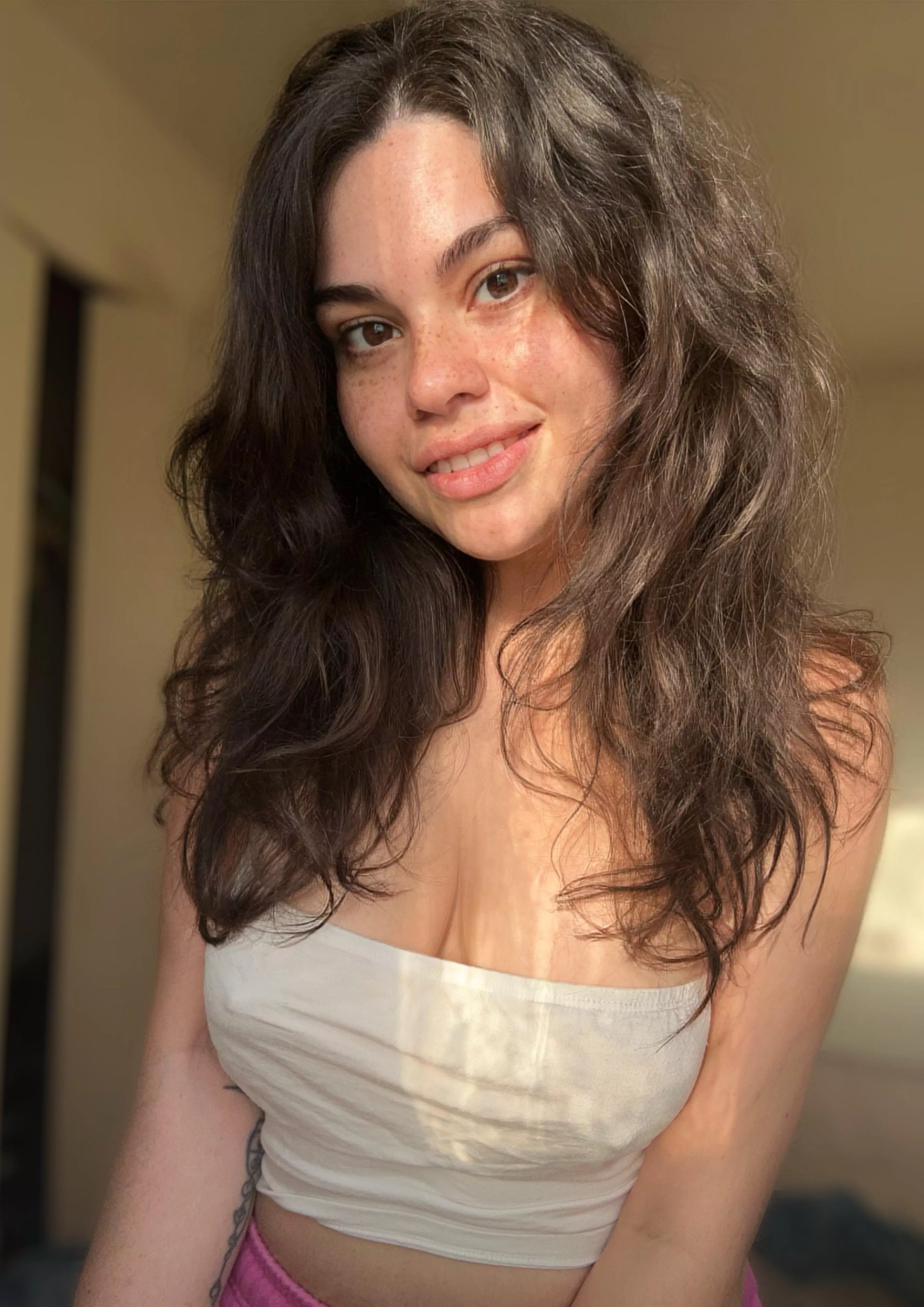 Just soaking in some sunshine in my very flimsy tube top 