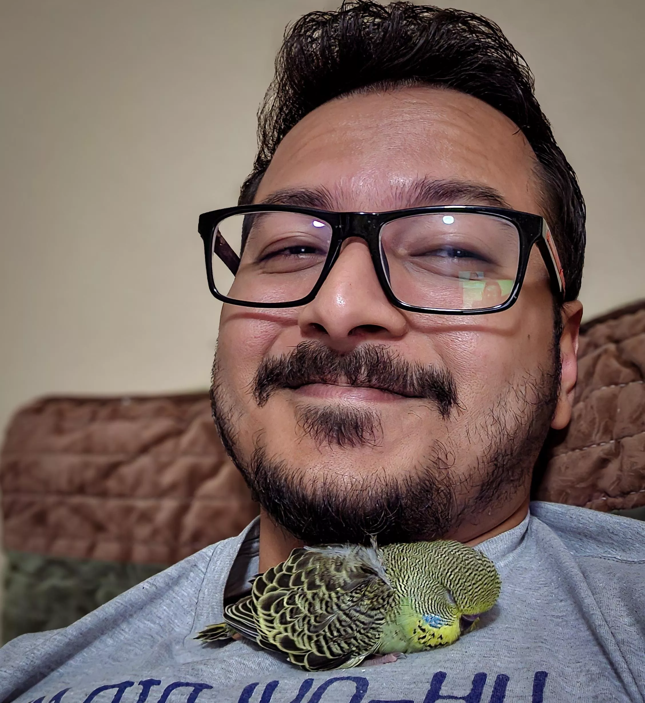 The little guy fell asleep snuggling the scruff.