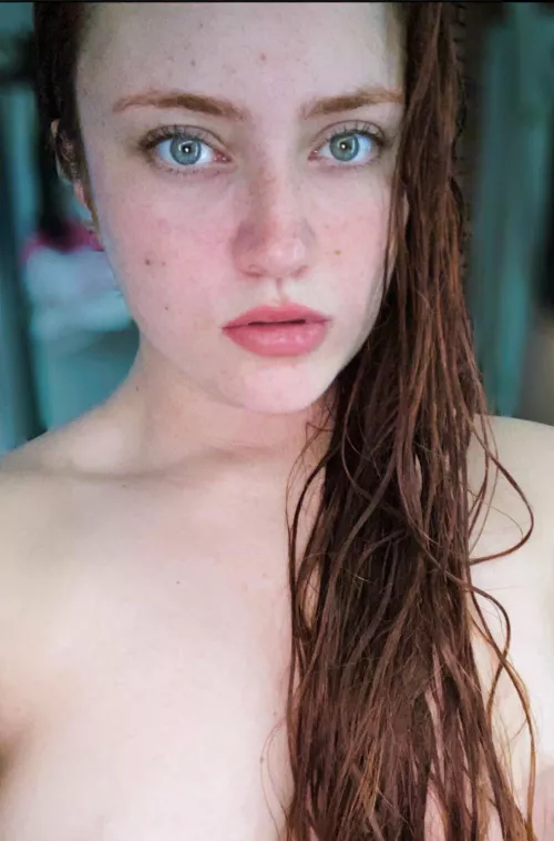 No makeup, wet hair, and wet…