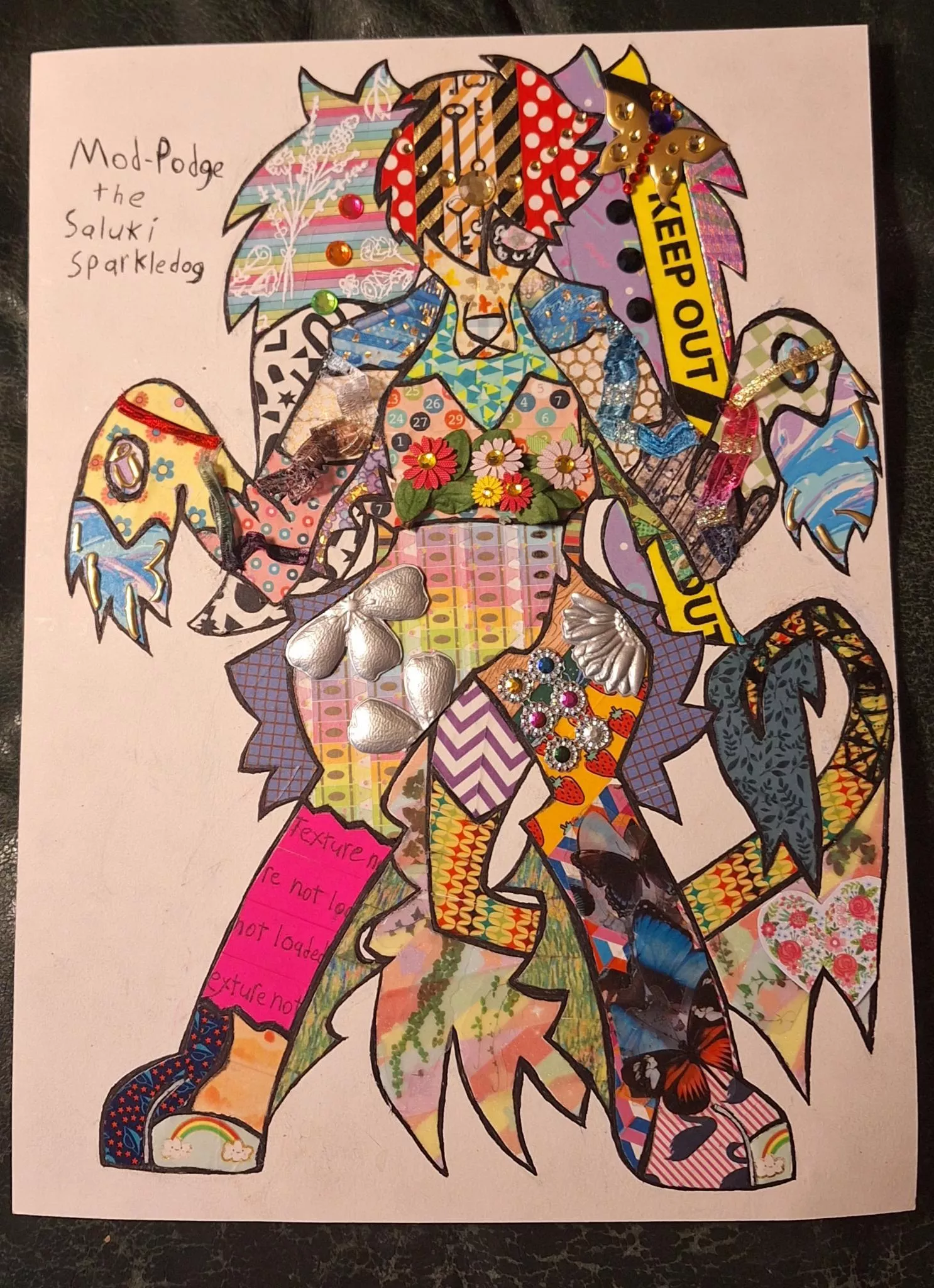 I made a sparkledog colored with washi tape and paper craft. I have a name but not a gender for them yet. They are a saluki.