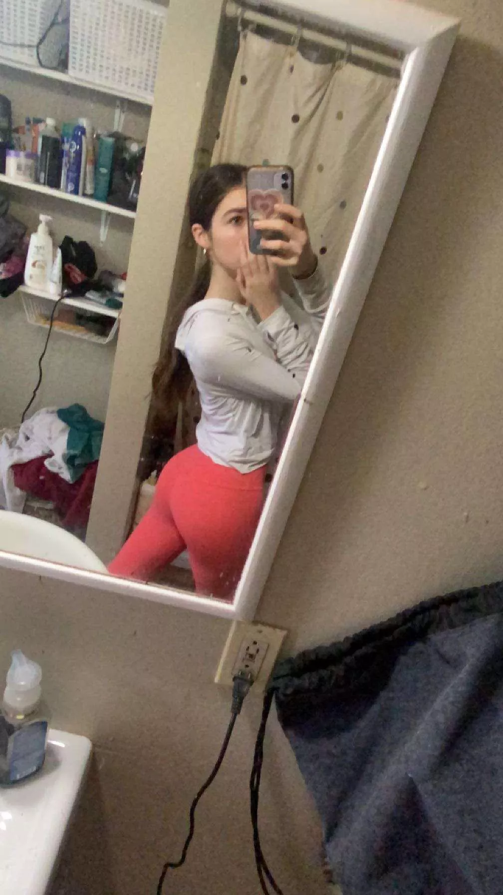 Pink leggings with a big booty