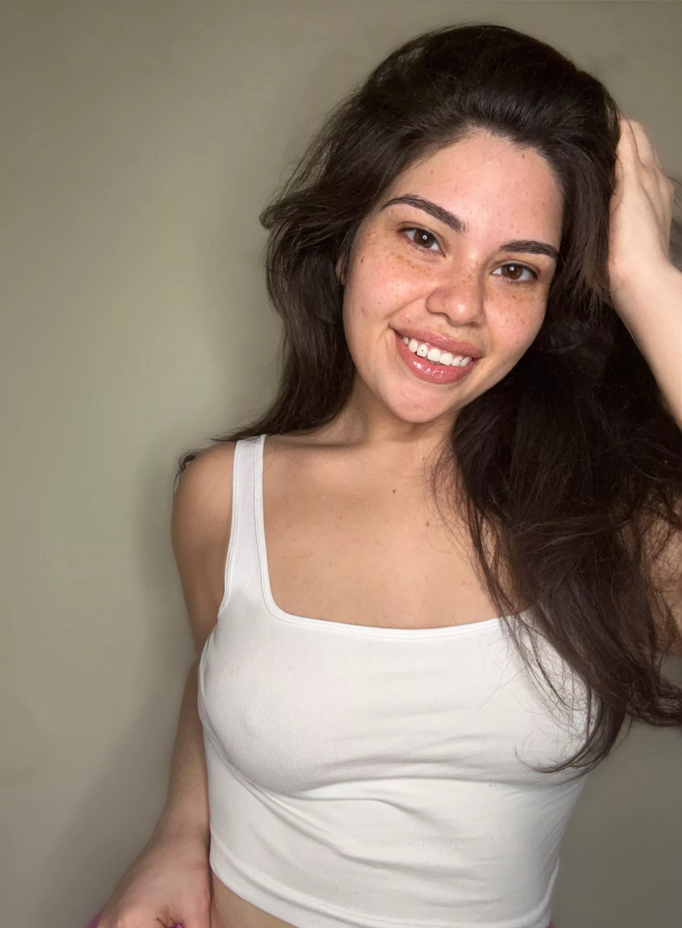 Braless in a white tank top yet again 