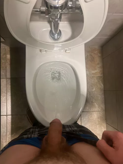 Pissing at the college bathroom 