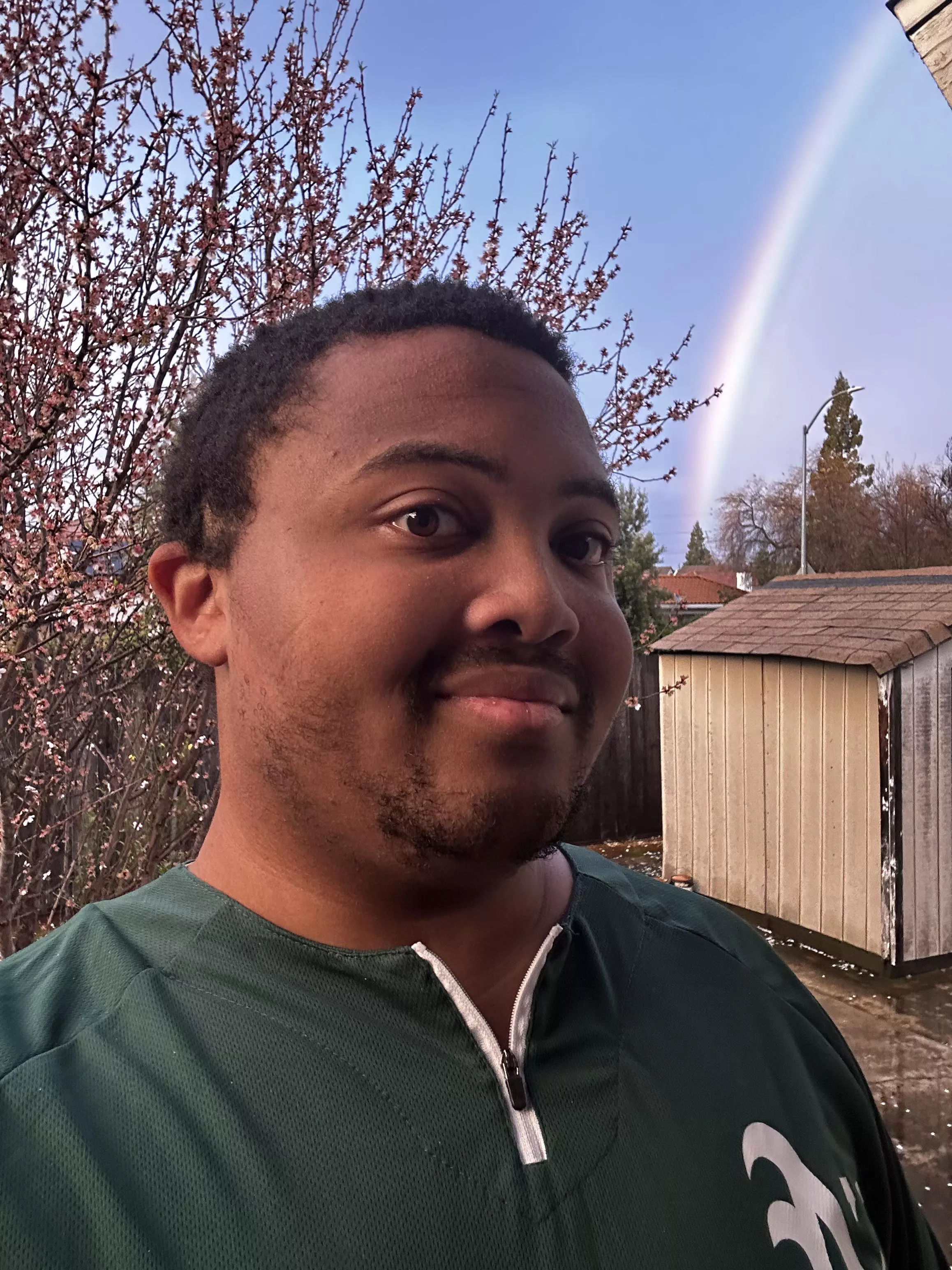 The rainbow seems to go behind that tree over there… is that a sign for me to go on a quest? lol