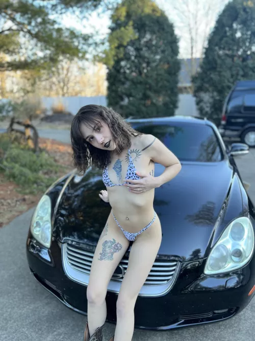 Your favorite tattooed car slut 
