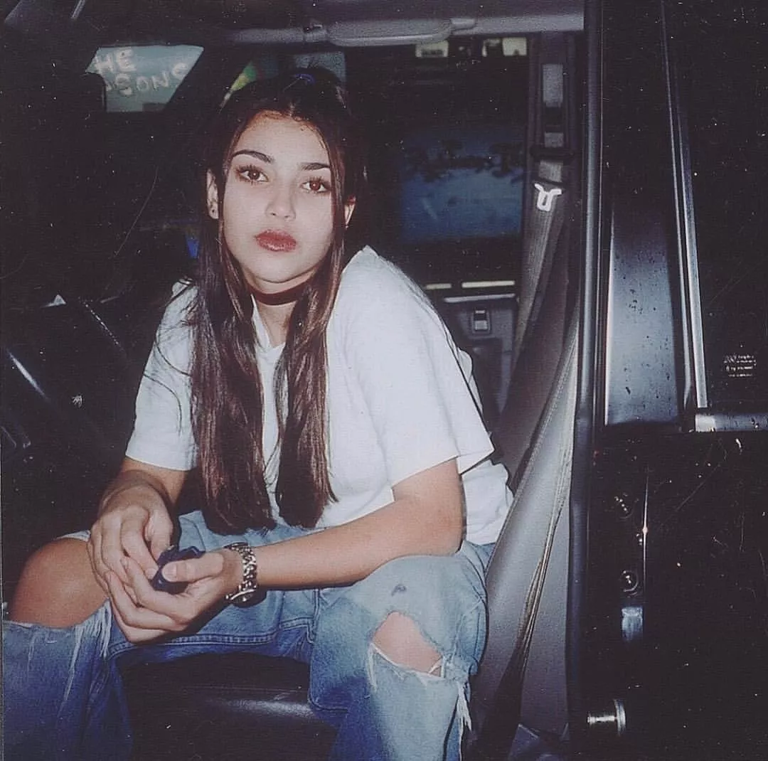 Teenage Kim Kardashian in the 90s