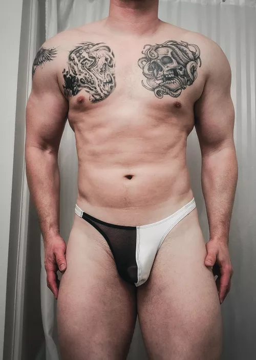 White with half black mesh pouch.