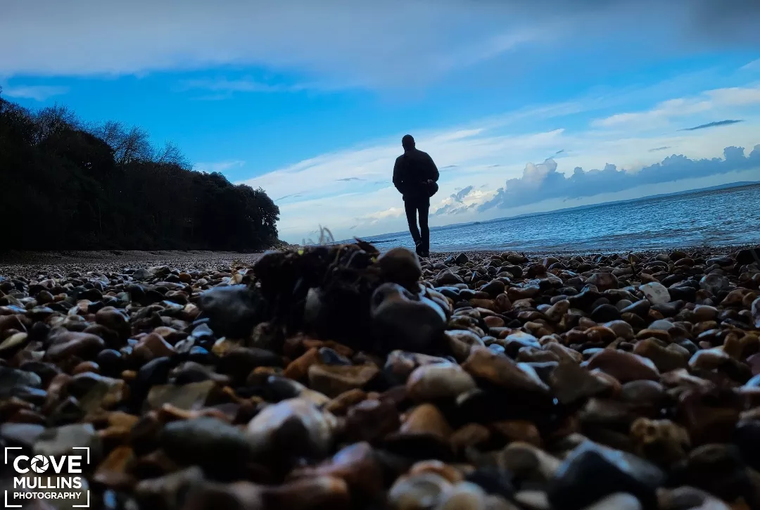 Walks along the pebbled beach
