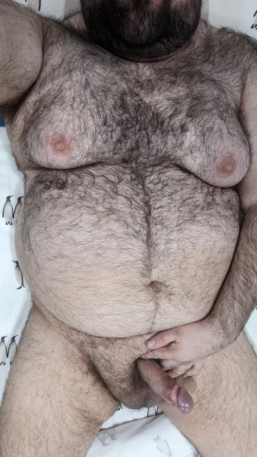 Just a horny man laying in bed.