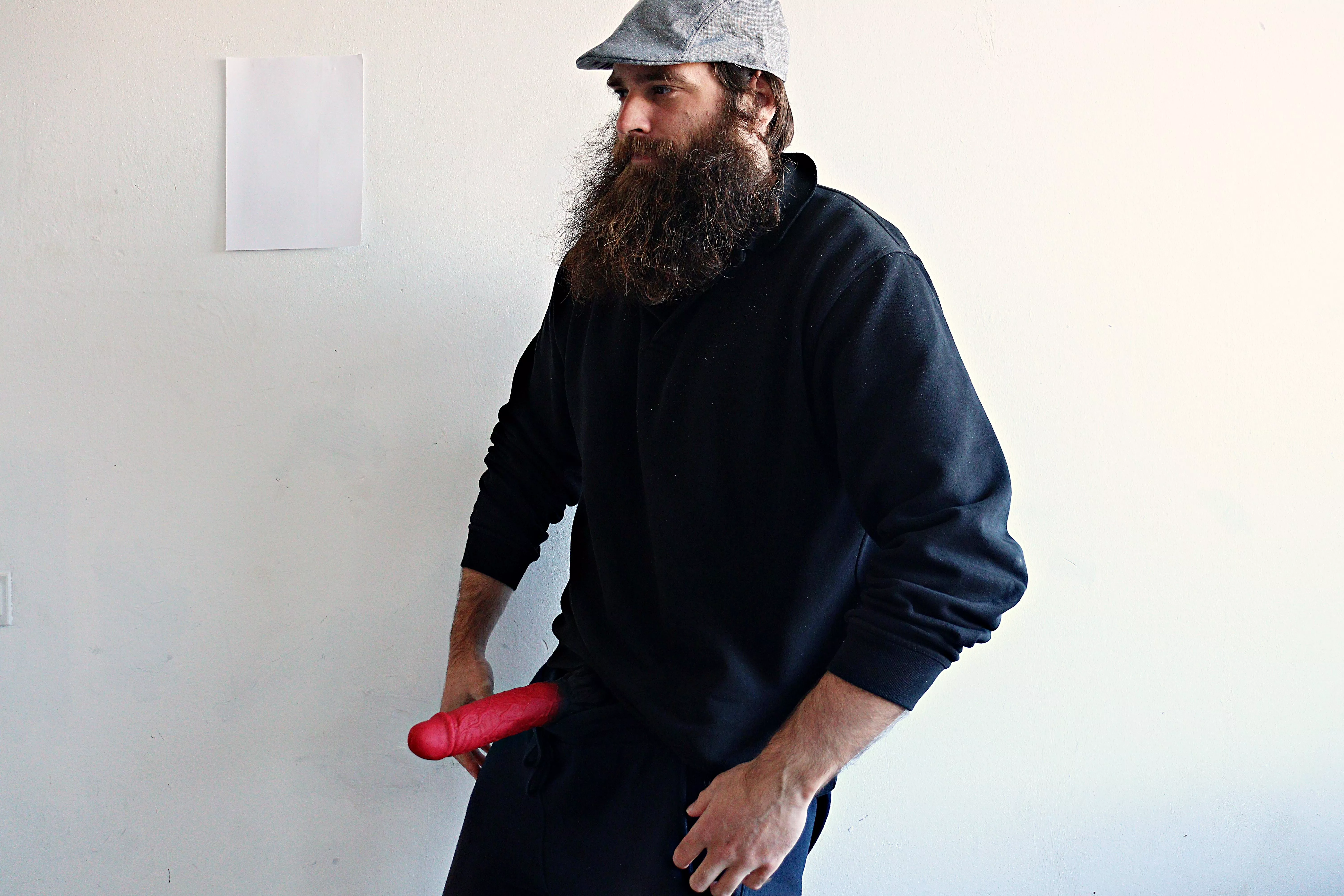 Me, with a cap and a large red dildo