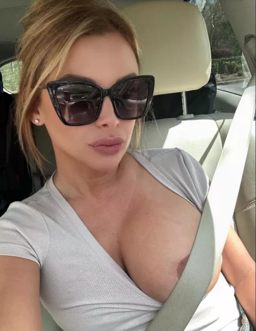 Taking out my one big boob while driving