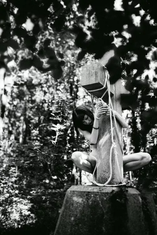 On cross in forest...