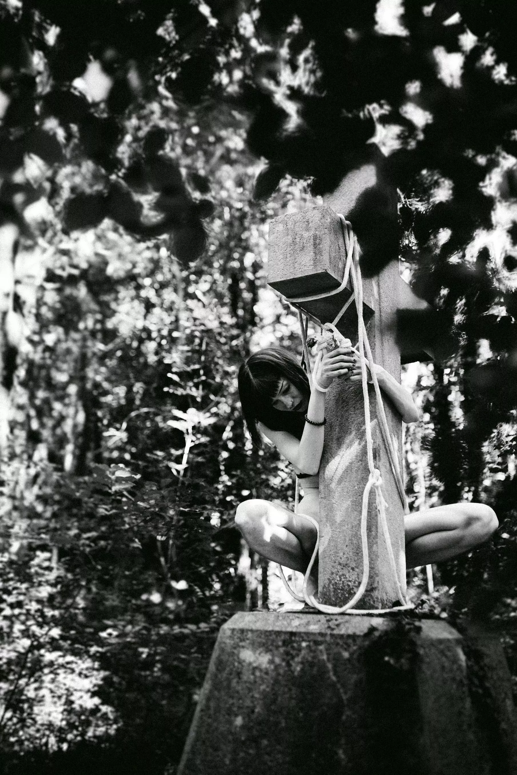 On cross in forest...