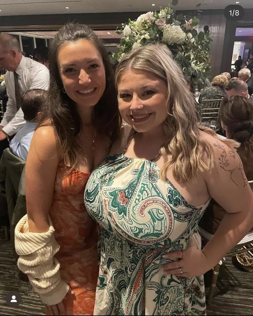 Her tits are so big they’re covering her friend’s
