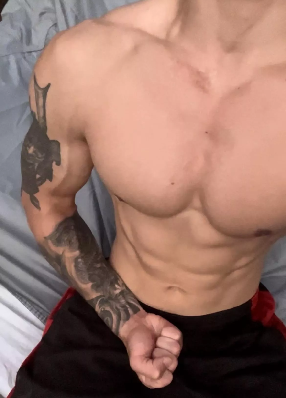 Tatted arm is all pumped up from tugging my 8 inch beast 🥰